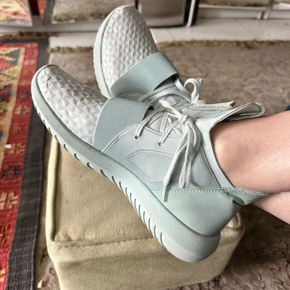 Adidas Tubular mint green sneakers.