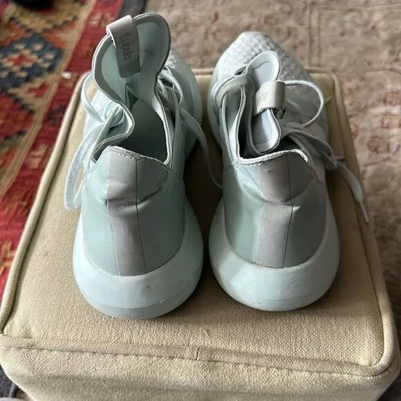 Adidas Tubular mint green sneakers.