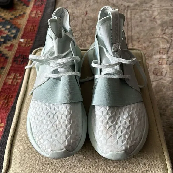 Adidas Tubular mint green sneakers.