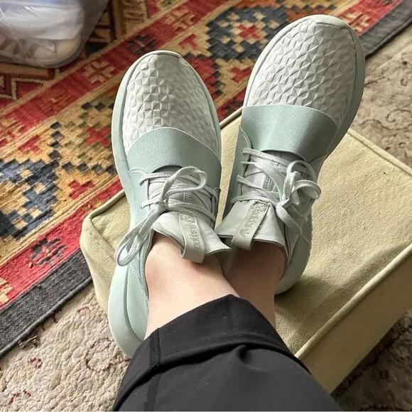 Adidas Tubular mint green sneakers.
