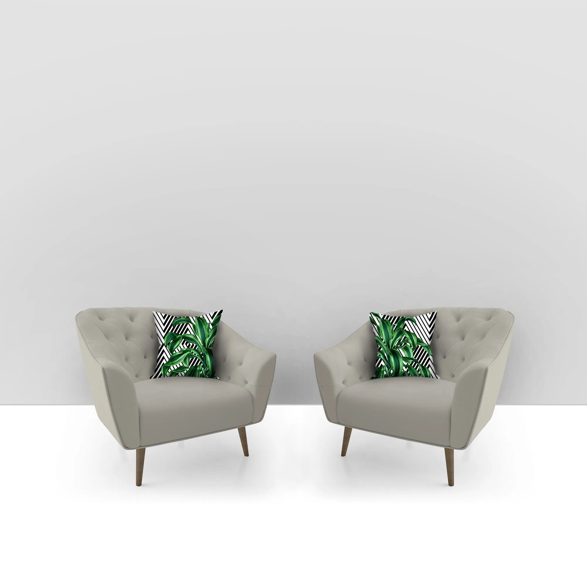 Tropical leaves pillows with geometrical accents. Set of 2